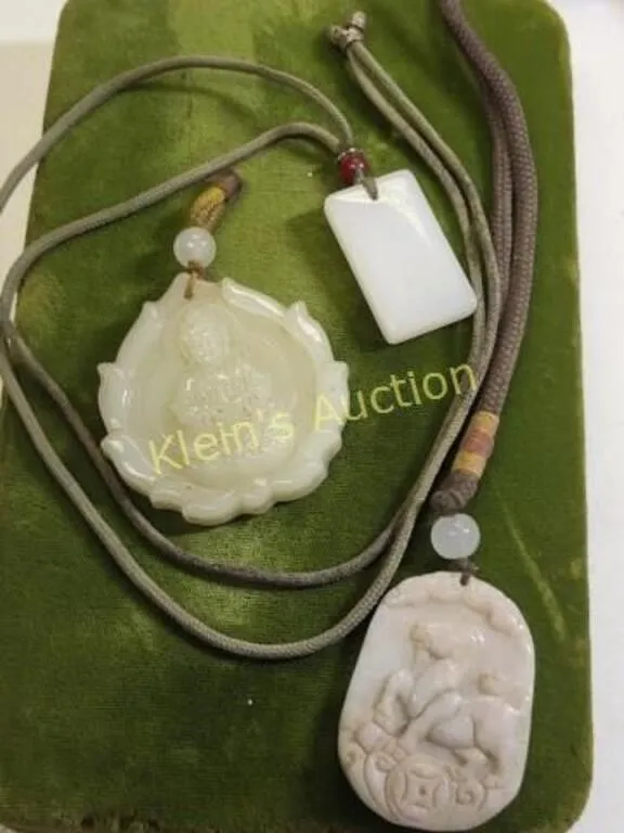 lot of 3 carved pendants Jade?          from auction in wilmington , North Carolina