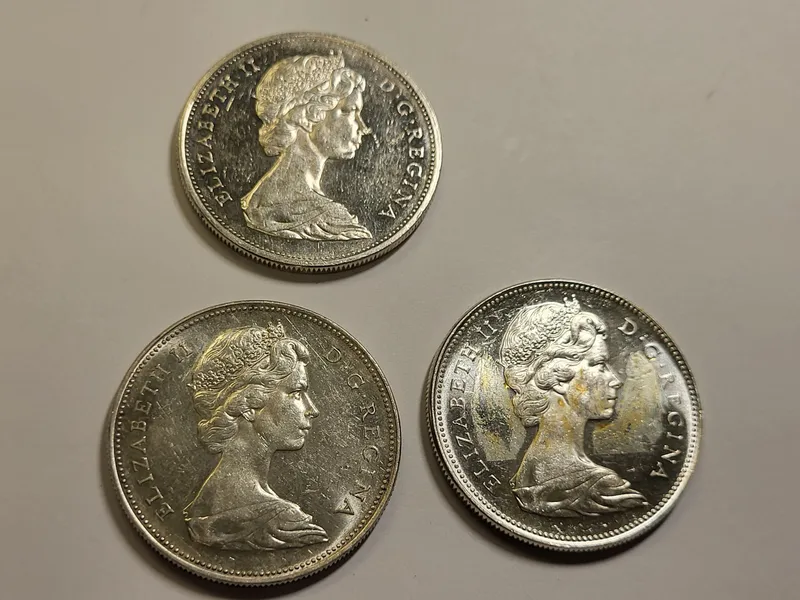 Canada silver dollar coins lot of3 AU-BU! from auction in wilmington , North Carolina