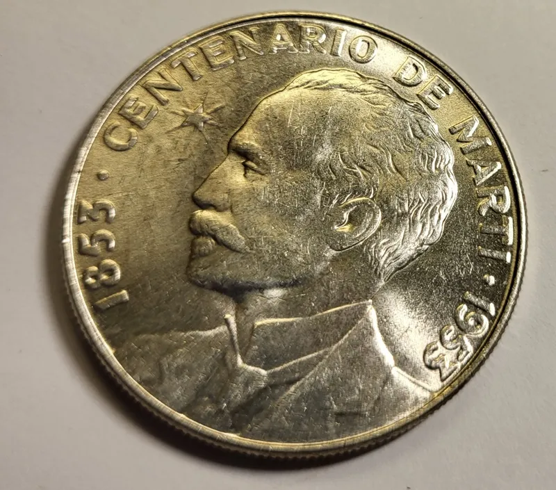 1953 Cuban 1 peso silver coin AU-BU from auction in wilmington , North Carolina