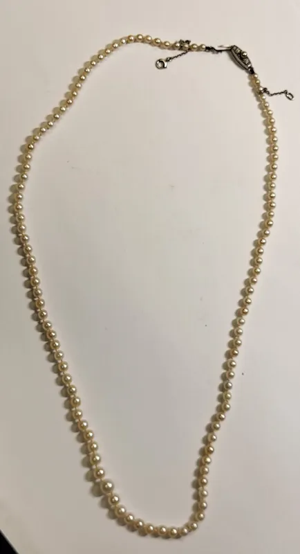 14K White gold clasp & 19" genuine pearls  from auction in wilmington , North Carolina