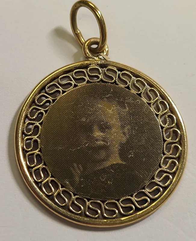 14K yellow gold pendant by Doskow from auction in wilmington , North Carolina