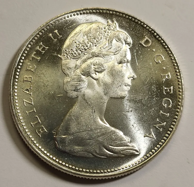 1965 Canada silver dollar coin bu? beauty from auction in wilmington , North Carolina