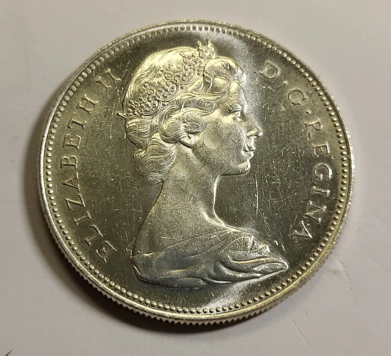 1966 canada silver dollar coin BU! from auction in wilmington , North Carolina
