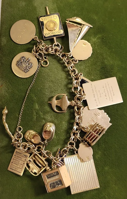 1960's 14K gold charm bracelet 64 grams! from auction in wilmington , North Carolina