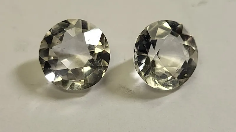 4 carats of moissanite 2 carats each round brilliant from auction in wilmington , North Carolina