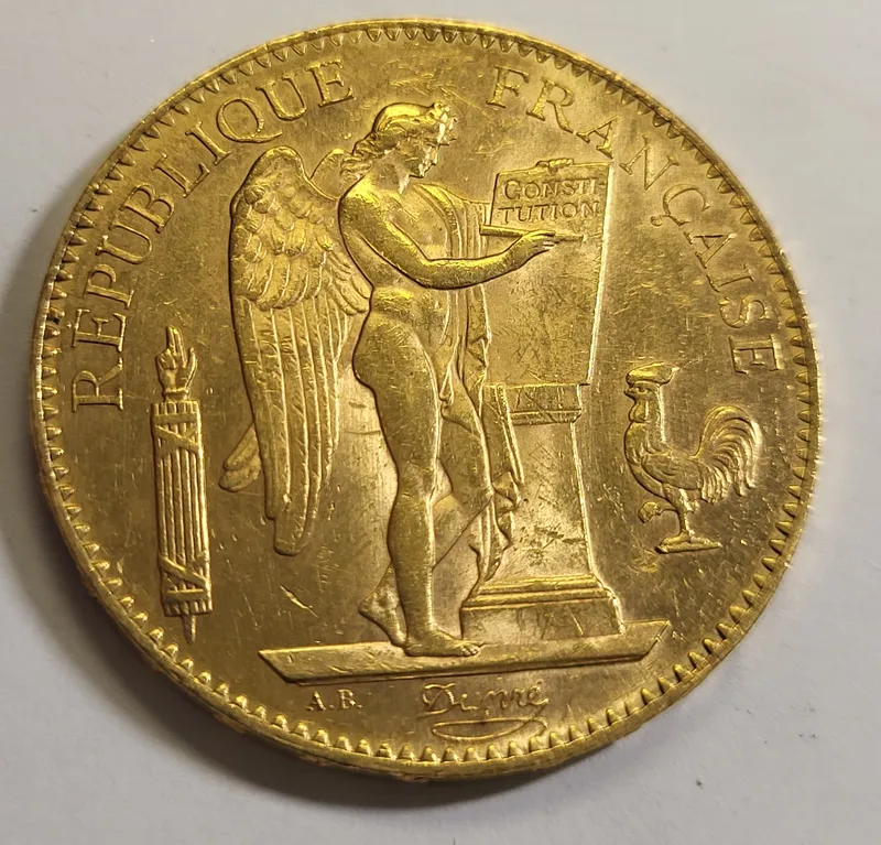 1906 A France 100 franc gold coin au-bu angel from auction in wilmington , North Carolina