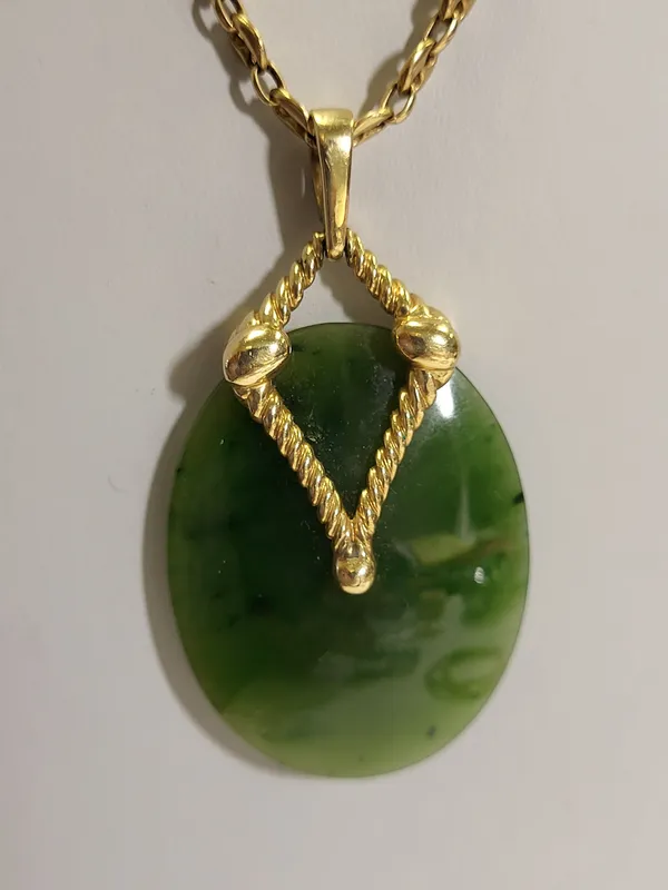 14K yellow gold necklace w/14K pendant w/jade from auction in wilmington , North Carolina