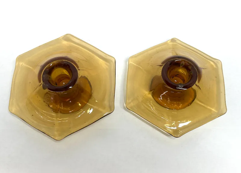 PAIR OF AMBER GLASS CANDLESTICKS from auction in BETHESDA, Ohio