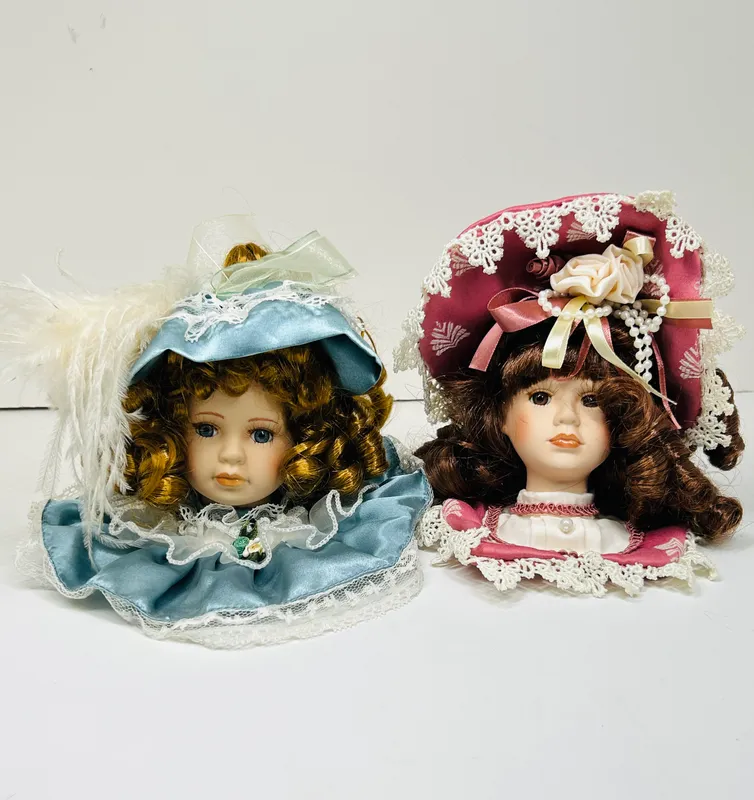 DANDEE PAIR PORCELAIN DOLL BUSTS 1990S from auction in BETHESDA, Ohio