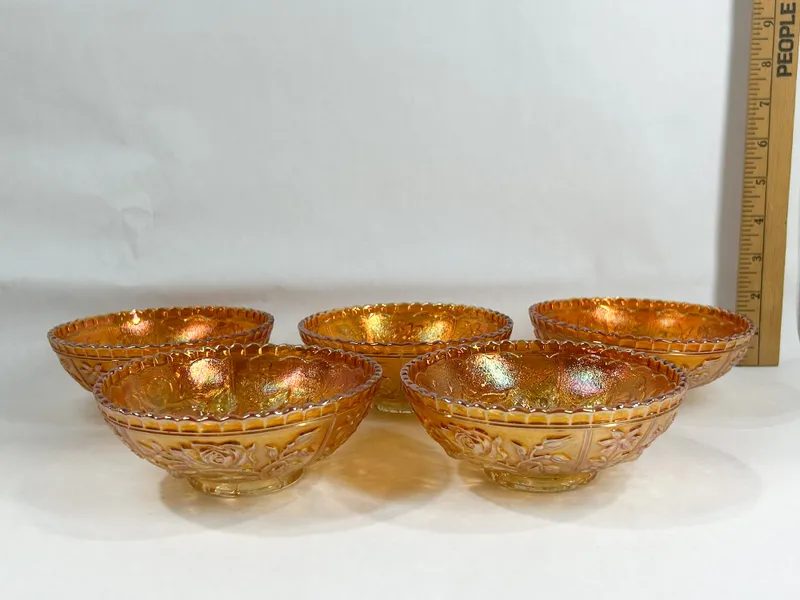 SET OF FIVE MARIGOLD CARNIVAL GLASS BOWLS from auction in BETHESDA, Ohio