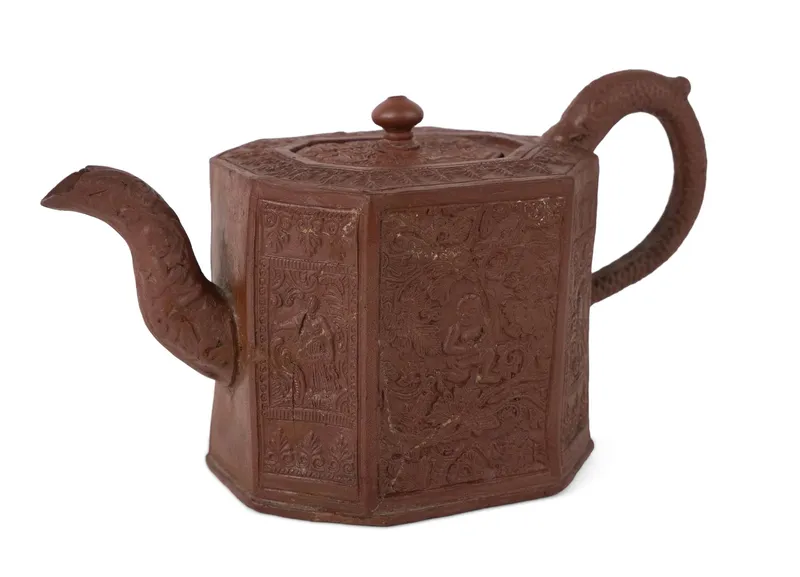 Relief-Molded "Indian Boy" Pattern Staffordshire Red Stoneware / Redware Teapot from auction in Bloomfield, New Jersey