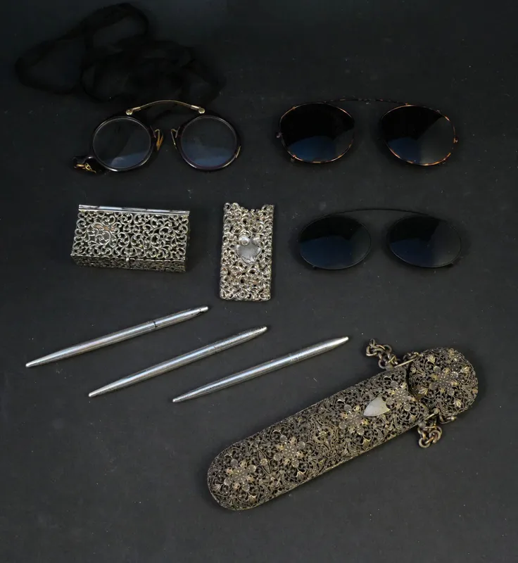 Vintage Eye Ware, Sterling and Smoking Items from auction in Bloomfield, New Jersey