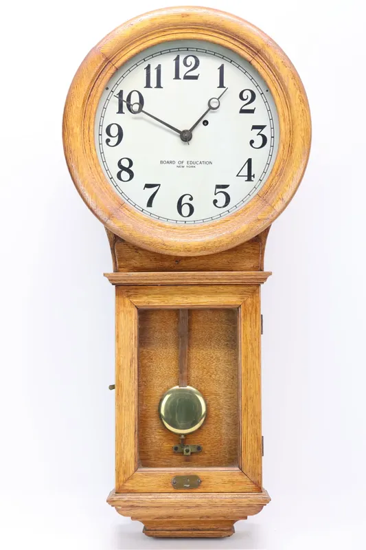 Antique New York Board of Education Oak Wall Clock from auction in Bloomfield, New Jersey