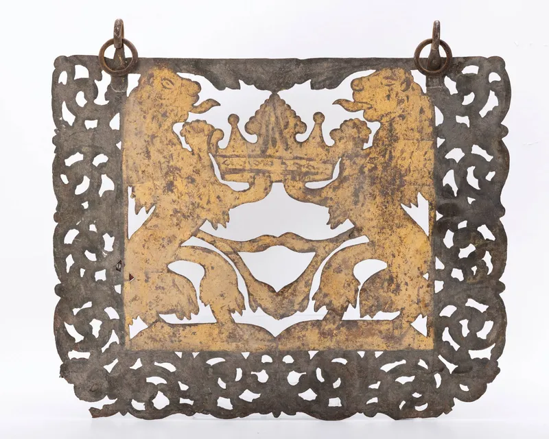A METAL SYNAGOGUE DECORATION from auction in woodmere, New York