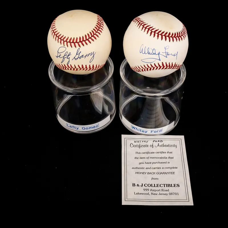Lefty Gomez & Whitey Ford Autographed AL Baseballs from auction in Union, Illinois