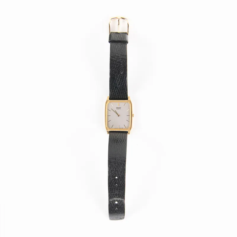 Seiko Gold Tone Rectangular Tank Watch 5P30-5039 from auction in Union, Illinois