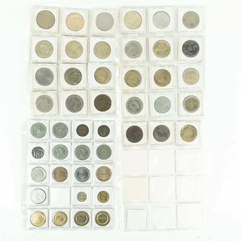 46 Assorted 90s-00s Riverboat Casino Gaming Tokens from auction in Union, Illinois