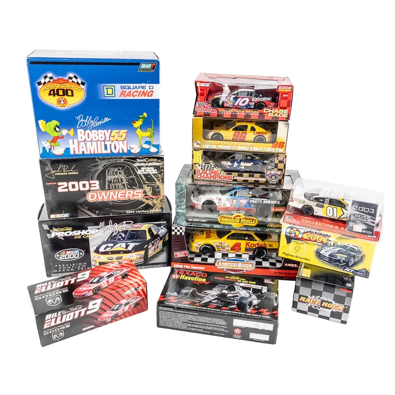 Collection of (13) NIB NASCAR Racing Model Cars from auction in Union, Illinois
