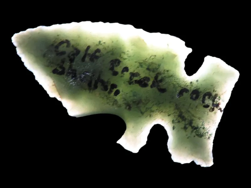 Incredible Green Side Notch Birdpoint found at the Calf Creek Rock Shelter, Searcy County Arkansas, Beautiful Vibrant Translucent Green Material. Ex Joey Ellis Collection. from auction in Quincy, Illinois