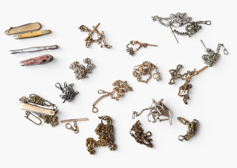 Group of Pocket Watch Chains and Knives from auction in West Chester, Pennsylvania