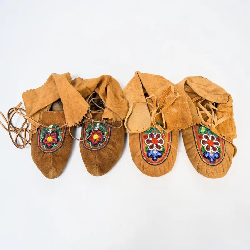 (2) Pairs of Native American Beaded Hide Moccasins (A) from auction in Saint Paul, Minnesota