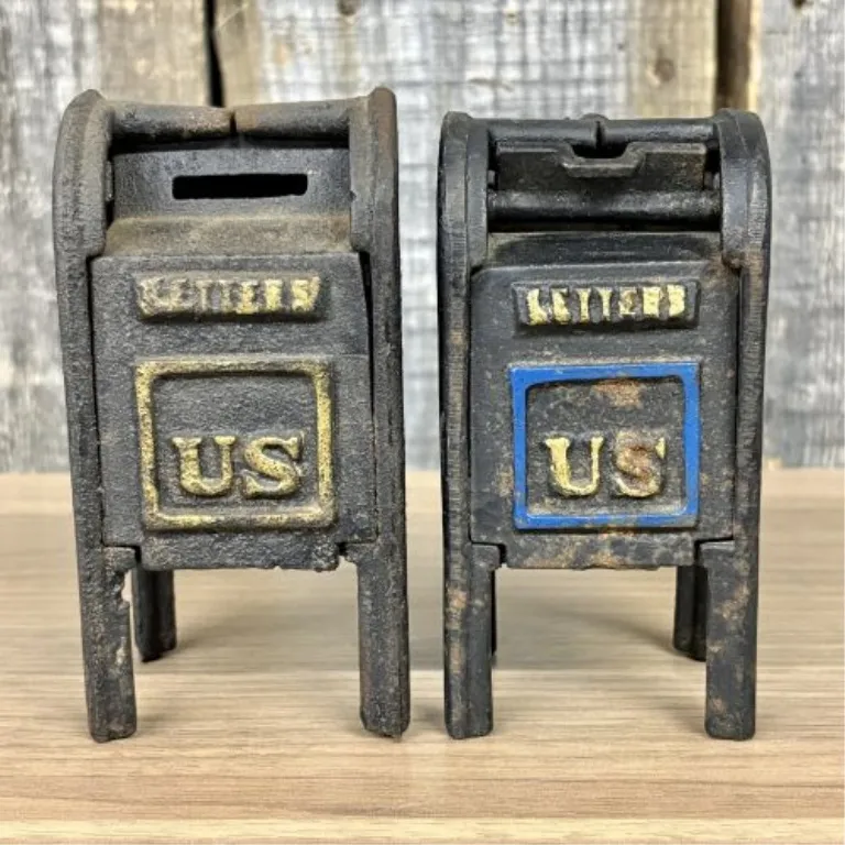 A Pair of U.S. Mail and Air Mail Still Banks from auction in Shelbyville, Kentucky
