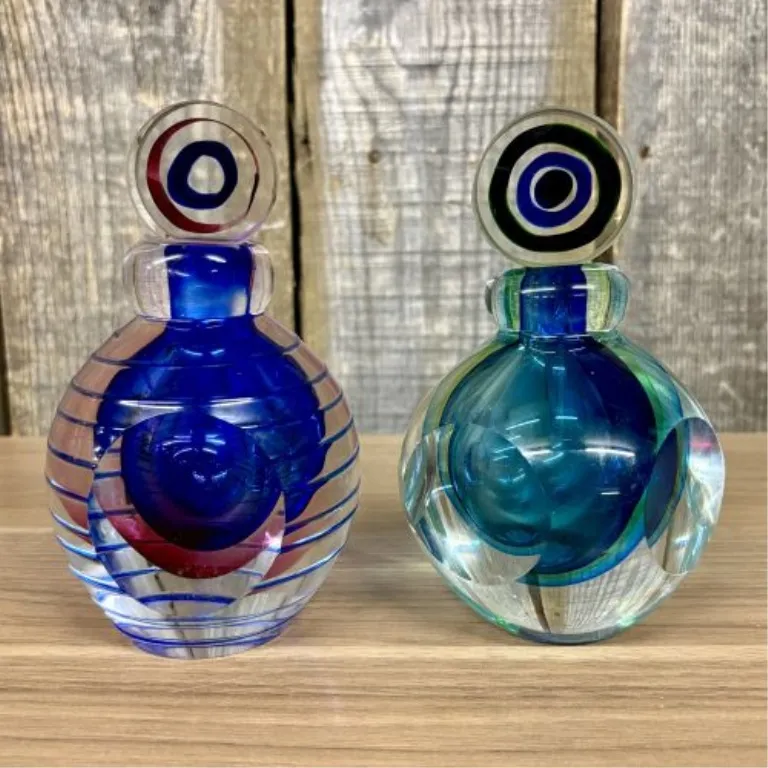 A Pair of Contemporary Sommerso Style Faceted Art Glass Perfume Bottles from auction in Shelbyville, Kentucky