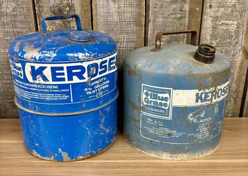 Two Blue Grass Belknap Inc. Steel 5 Gallon Kerosene Cans from auction in Shelbyville, Kentucky