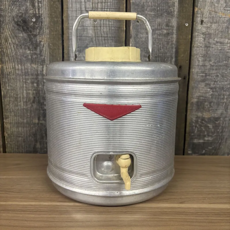 Vintage Belknap Bluegrass Aluminum Beverage Dispenser with Ceramic Liner from auction in Shelbyville, Kentucky