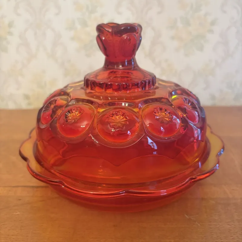 Amberina Moon and Star Glass Covered Butter Dish from auction in Shelbyville, Kentucky