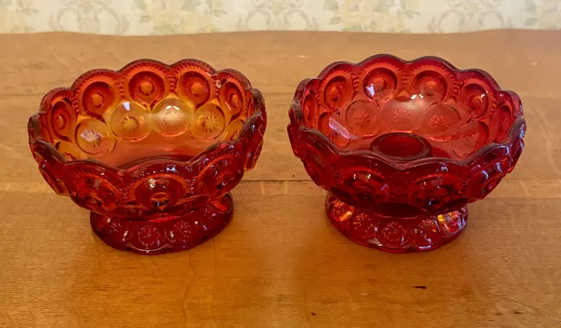 A Pair of Amberina Glass Moon and Star Pattern Table Articles from auction in Shelbyville, Kentucky