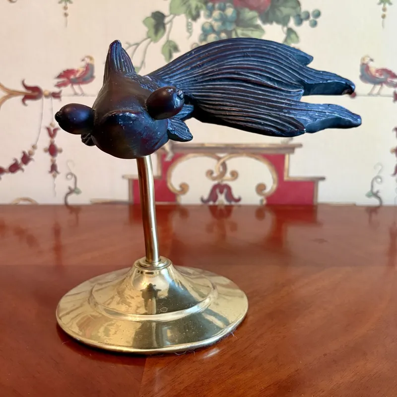 Carved Patinated Wood Telescope Eye Goldfish Sculpture on Brass Stand from auction in Shelbyville, Kentucky