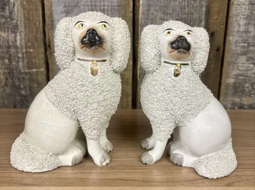 A Pair of Staffordshire Confetti Poodle Figurines from auction in Shelbyville, Kentucky