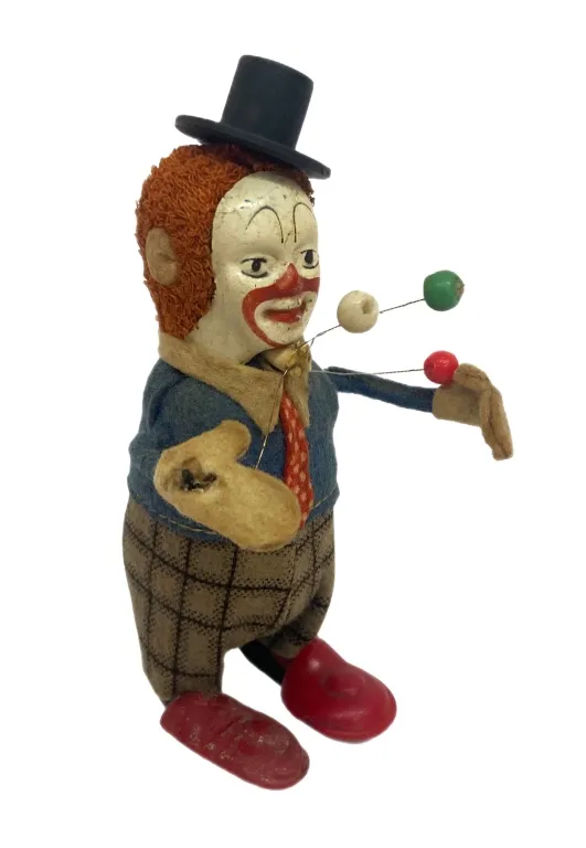 German Wind-Up Schuco Clown Juggler Toy with Key from auction in Spring Valley, New York