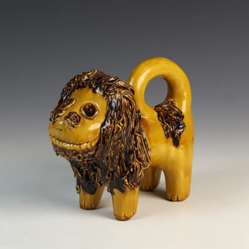 Lester Breininger Redware Folk Art Spaghetti Lion Figurine from auction in Morgantown, Pennsylvania