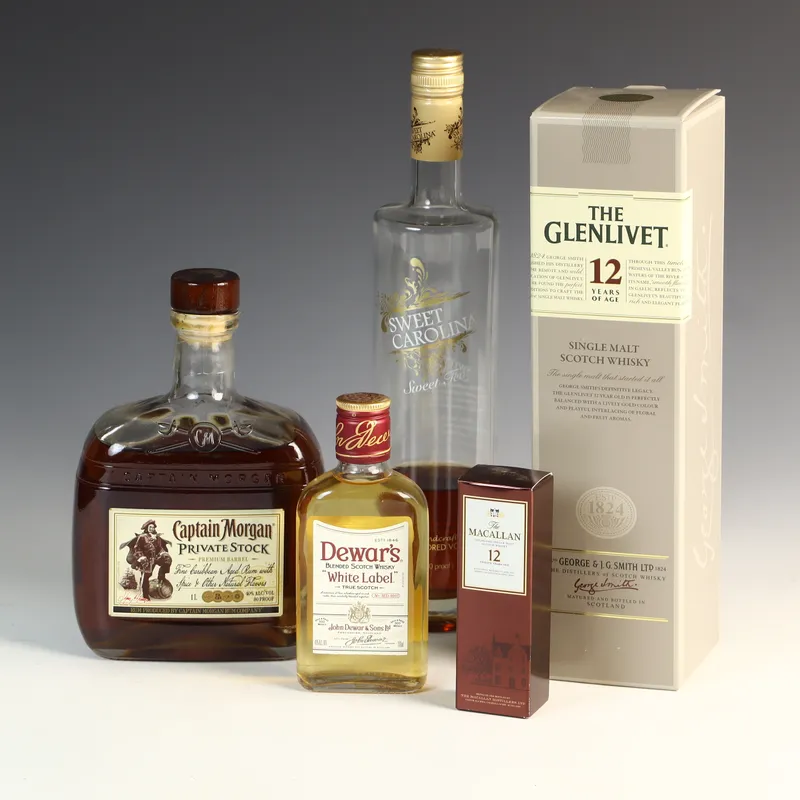A Collection of Five Assorted Distilled Spirit Bottles Including The Glenlivet 12 Year Old Single Malt Scotch Whisky from auction in Morgantown, Pennsylvania