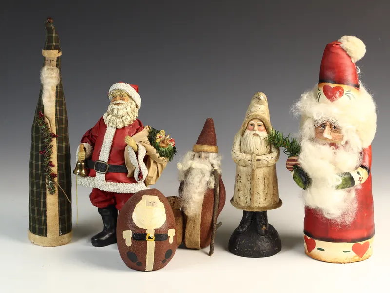 Collection of Six Vintage Folk Art and Traditional Santa Claus Figurines including B Swann Designs from auction in Morgantown, Pennsylvania