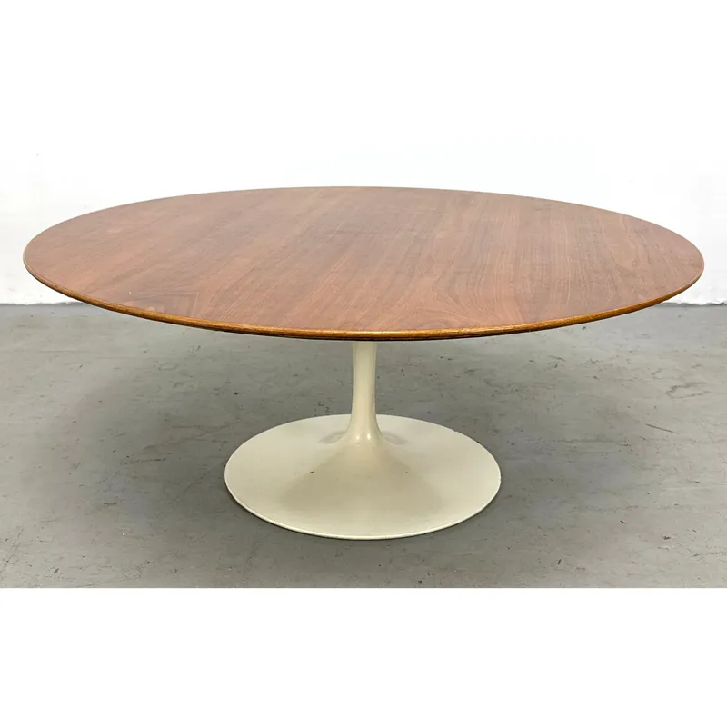 Eero Saarinen for Knoll Walnut Tulip Coffee Table. White Pedestal Base. Signed with Knoll Associates from auction in Upper Chichester, Pennsylvania
