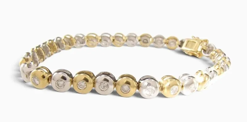 14K Two Tone Diamond Link Bracelet from auction in Carmel, Indiana
