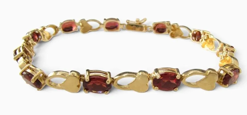 14K Yellow Gold Garnet Link Bracelet from auction in Carmel, Indiana