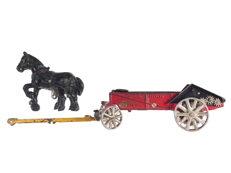 Arcade Cast Iron McCormick-Deering 402L Horse-Drawn Spreader 13" from auction in Myakka City, Florida