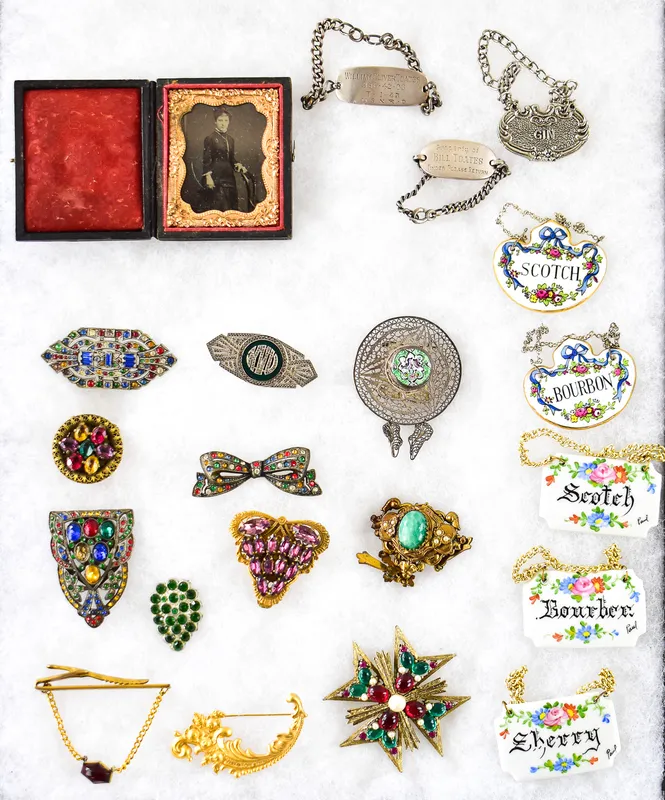 ANTIQUE DECOR ASSORTMENT: TIN-TYPE, DECANTER LABELS, STELRING SILVER, JEWELRY from auction in Aurora, Oregon