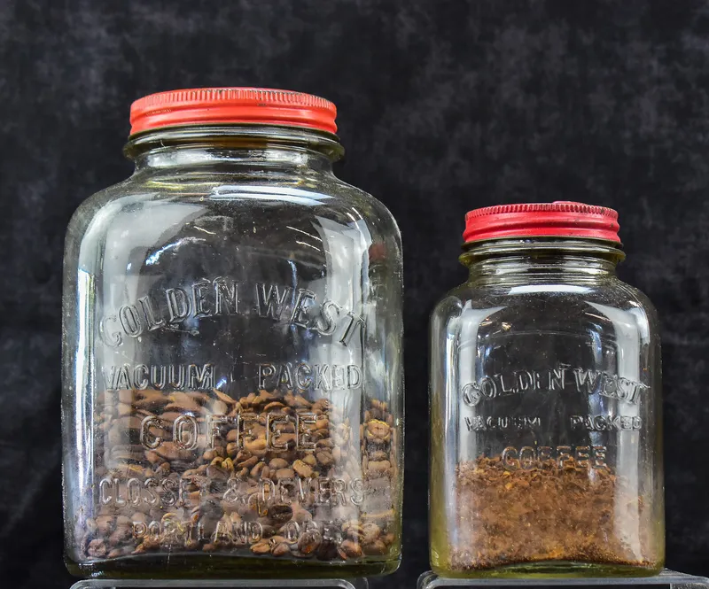  TWO CLOSSET & DEVERS GOLDEN WEST COFFEE JARS, PORTLAND, OR from auction in Aurora, Oregon