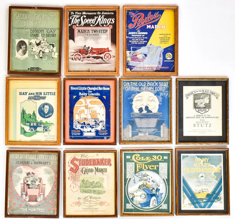 11 FRAMED AUTOMOBILE THEMED POSTERS & SHEET MUSIC COVERS from auction in Aurora, Oregon