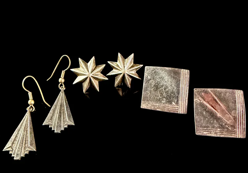A Trio of Matched Pairs of Sterling Silver Earrings including Tahe Navajo Drop Earrings from auction in Campbell, New York