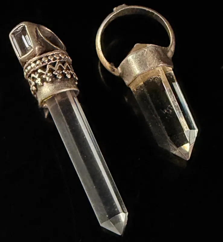 Two Clear Quartz Crystal Point Pendants with Silver-Toned Metal Mounts from auction in Campbell, New York