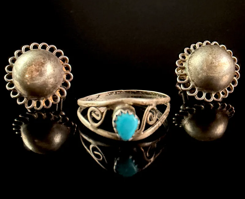 A Trio of Sterling Silver Jewelry Including a Turquoise Ring and a Pair of Domed Earrings from auction in Campbell, New York