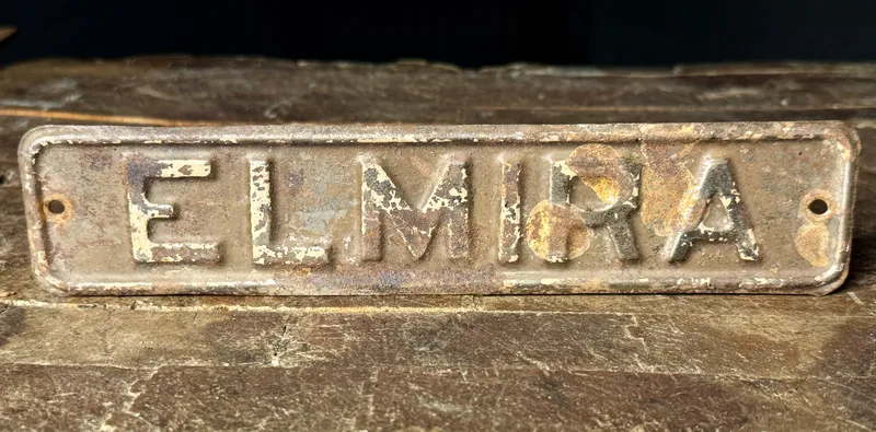 Vintage Embossed Metal Elmira Nameplate Sign from auction in Campbell, New York