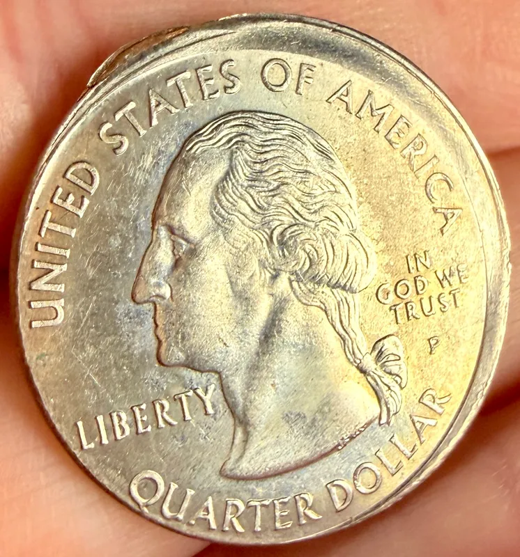 US 1999-P Georgia Statehood Quarter Dollar Mint Error Broadstruck from auction in Campbell, New York