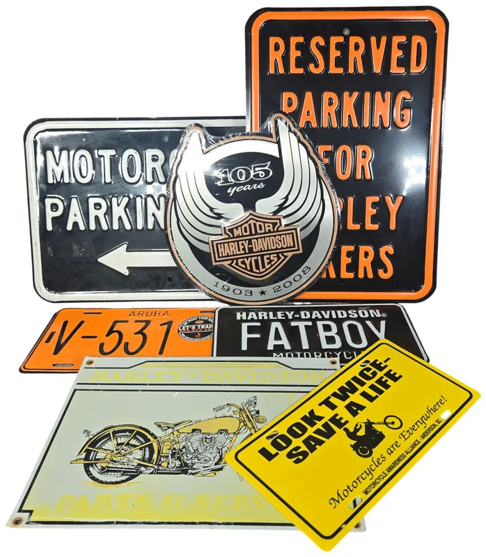 Seven Harley-Davidson and Motorcycle Themed Signs and License Plates from auction in Lancaster, Ohio